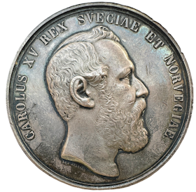 Karl XV - Konungens död 1872 - Ett vackert exemplar av en pampig silvermedalj graverad av Lea Ahlborn