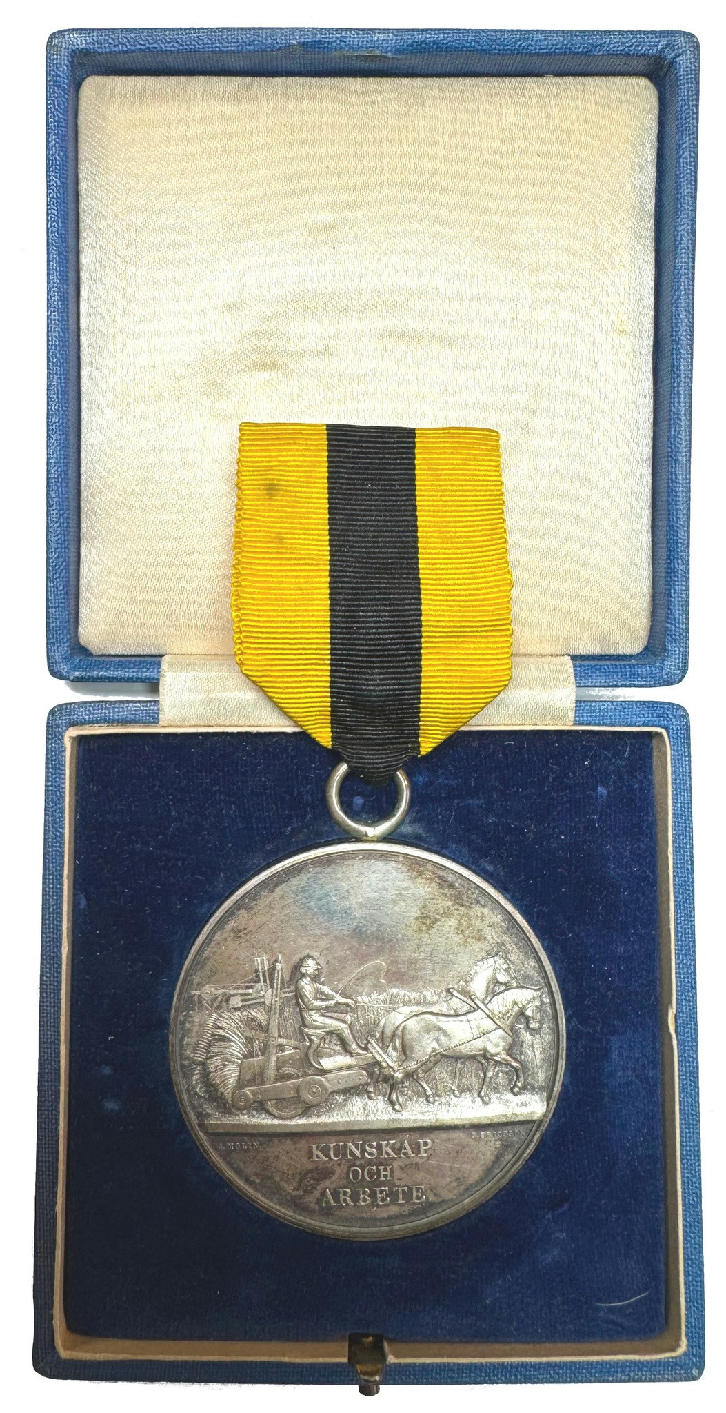 Skaraborgs läns kungliga hushållningssällskaps belöningsmedalj av Johannes Edvard Ericsson (1862) - Komplett helobjekt med etui och band