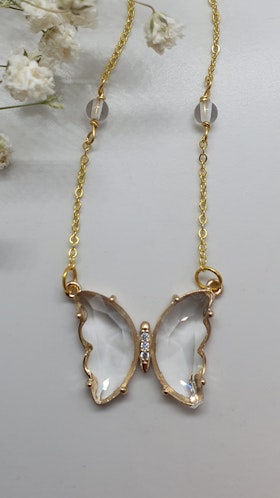 Halsband Butterfly med en glasberlock och pärlor av bergkristall