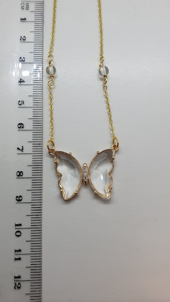 Halsband Butterfly med en glasberlock och pärlor av bergkristall