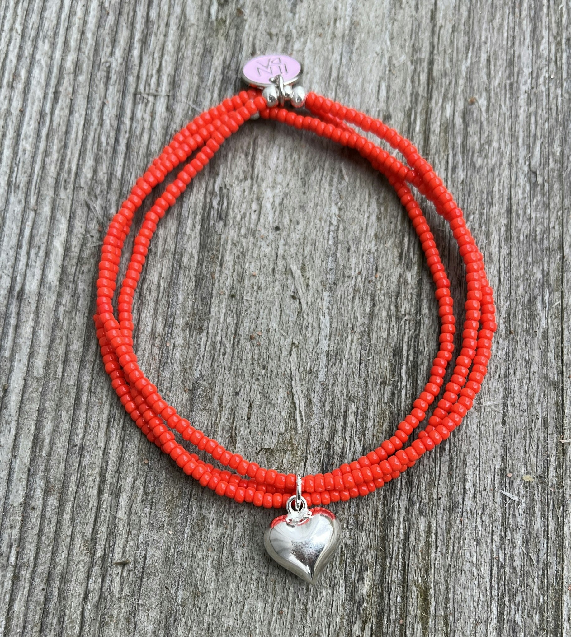 Tre armband i ett, rött