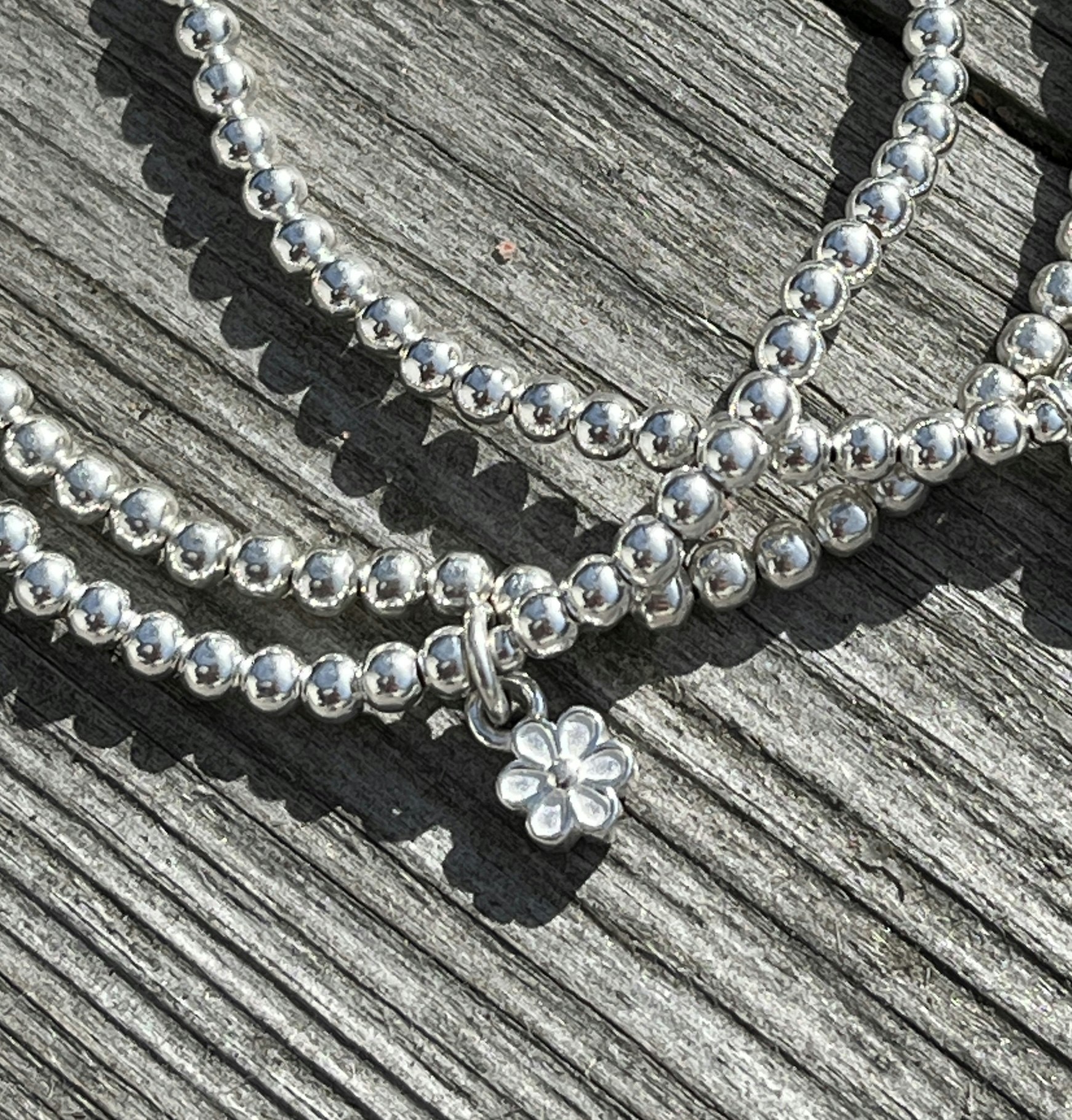 Armband med blomberlock