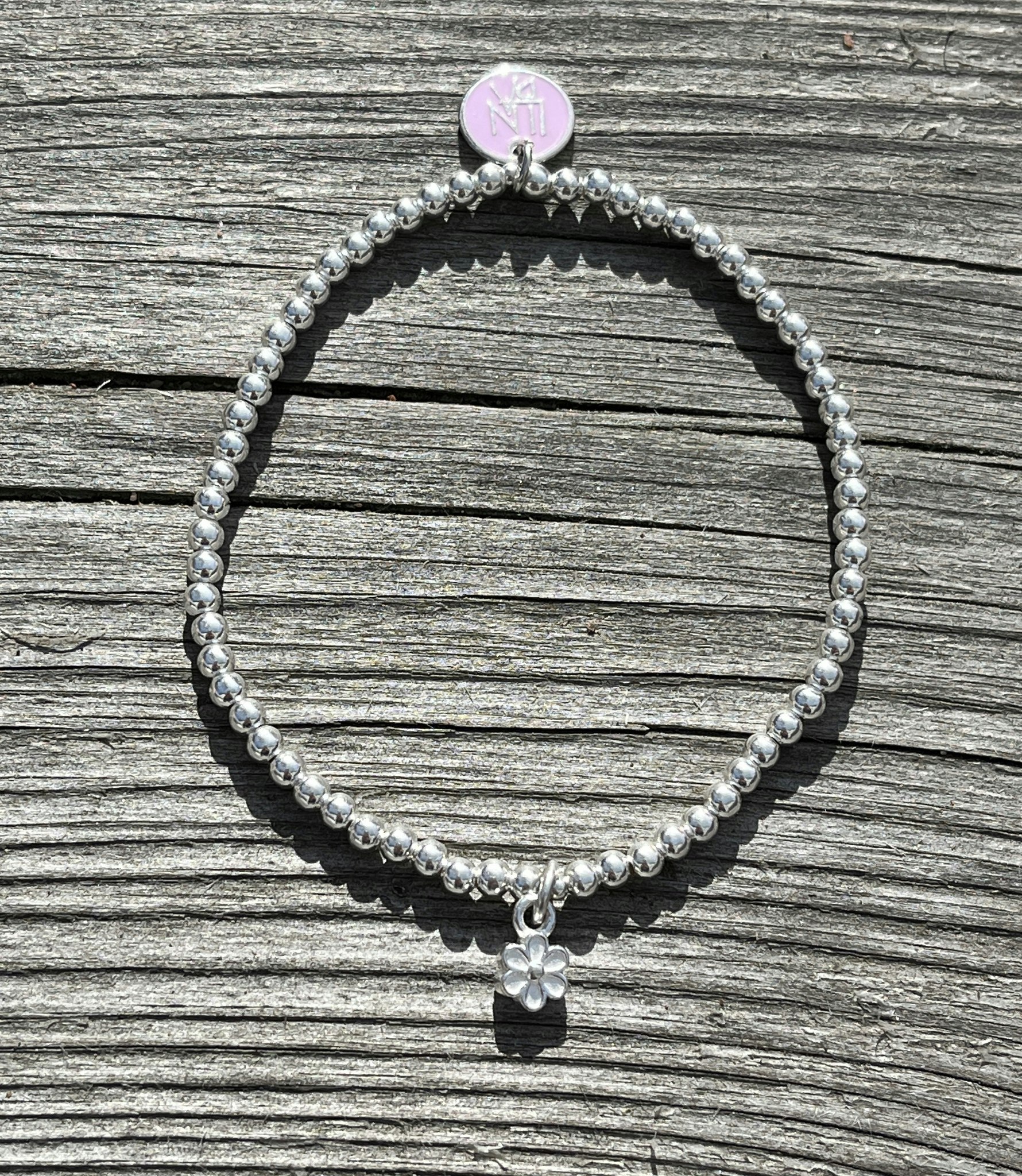 Armband med blomberlock