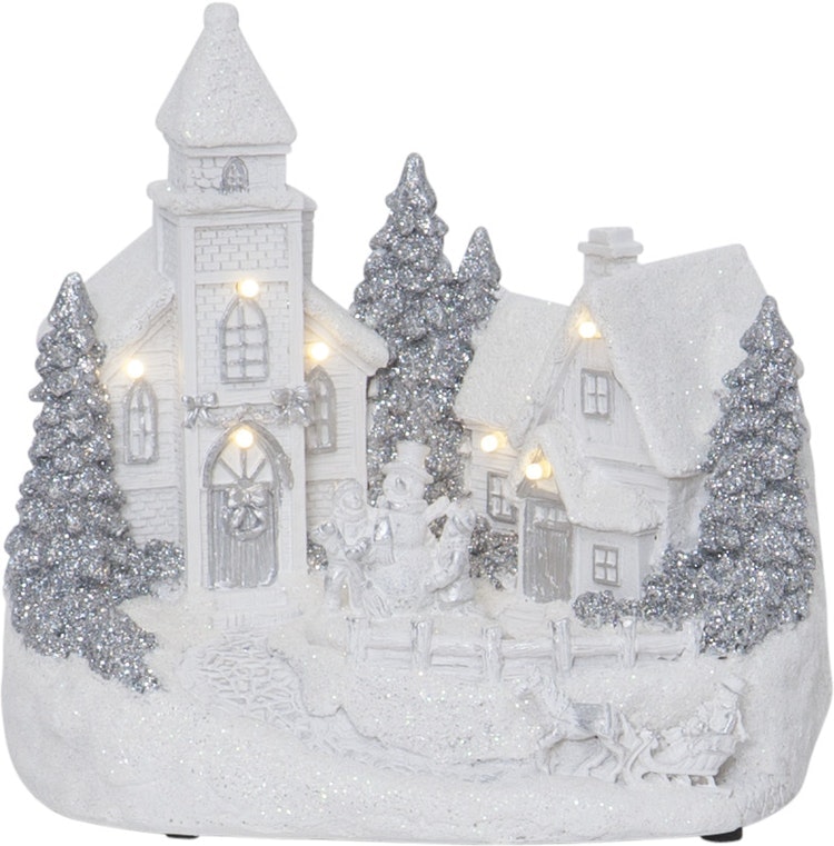 Julby med kyrka och snötäckta tak - finns i God gärnings designbutik