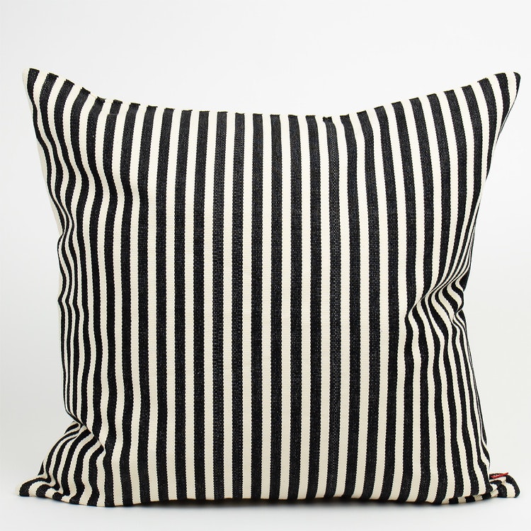 Cushion cover Donia from Afro Art, made from a sturdy hand-woven cotton quality with thin black stripes on off-white.