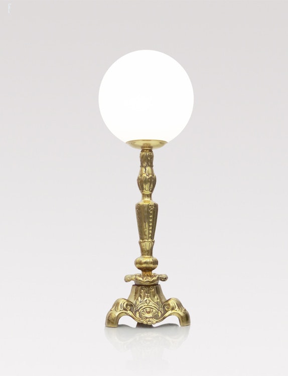 brass empire styled table lamp with opal gloss globe on top