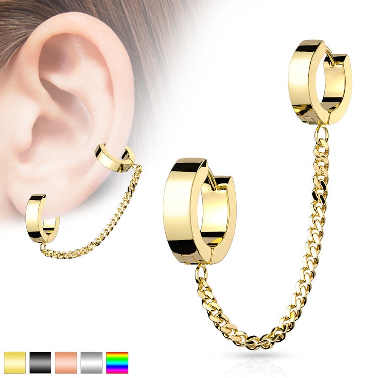 Örhänge och helix i ett smycke med kedja