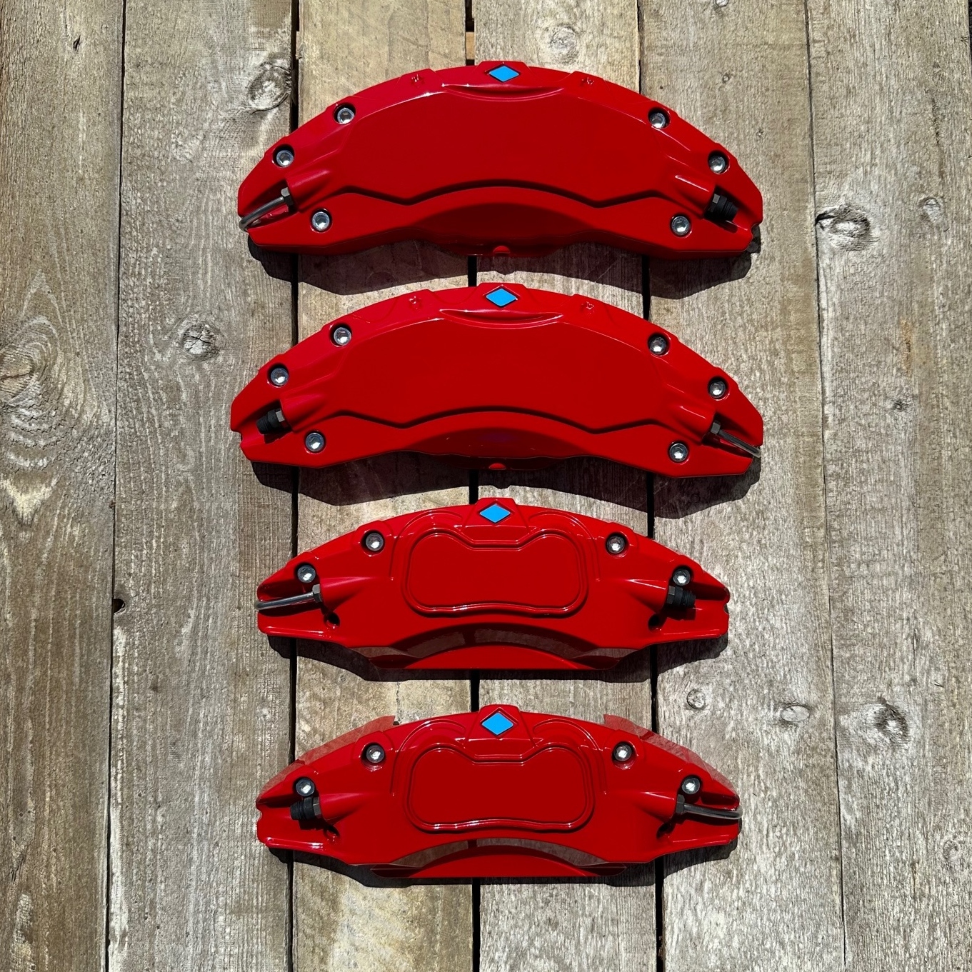 Kåpor till bromsoken, röda - Tesla Model Y