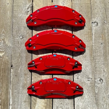 Kåpor till bromsoken, röda - Tesla Model 3