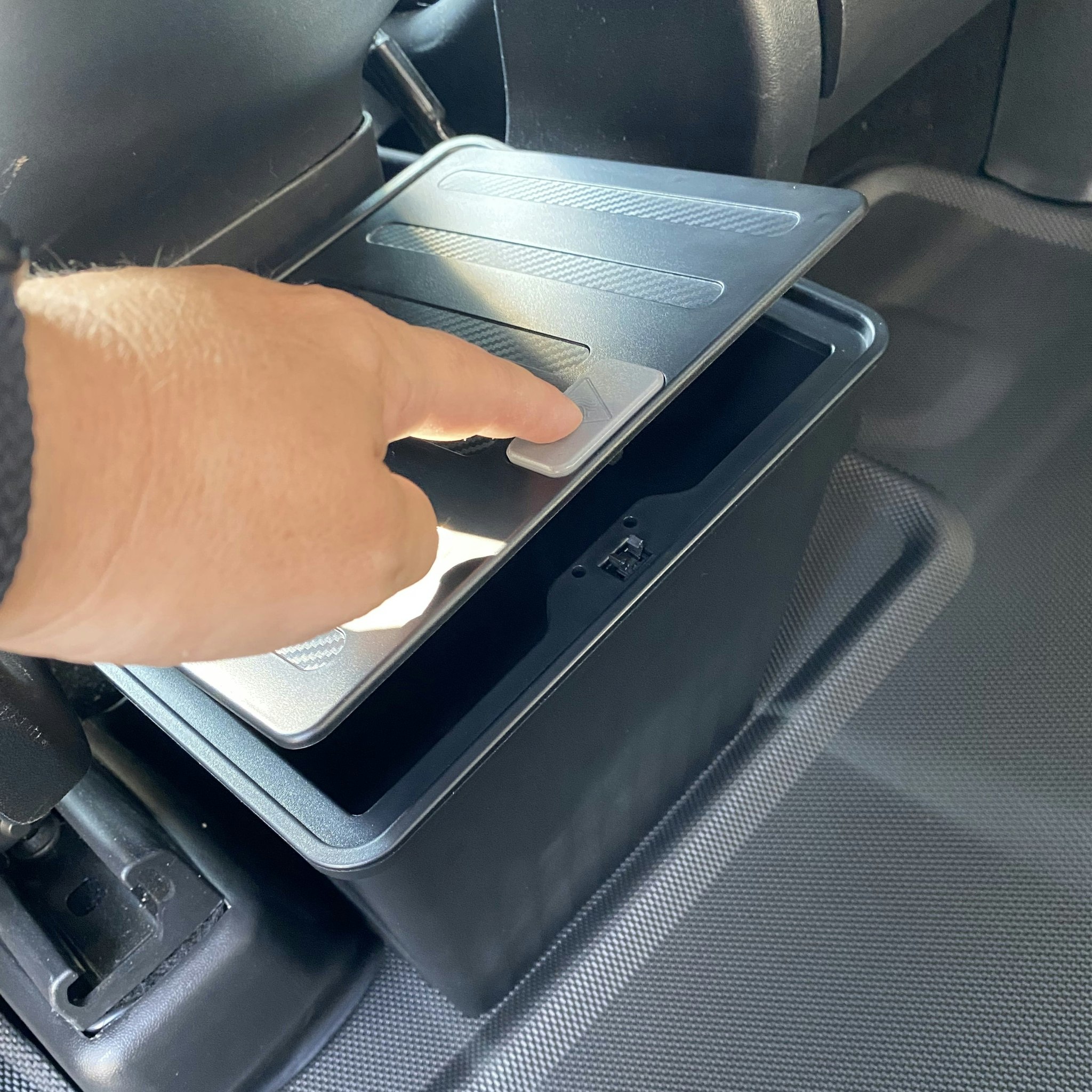 Rear seat storage, click lid - black - Tesla Model Y