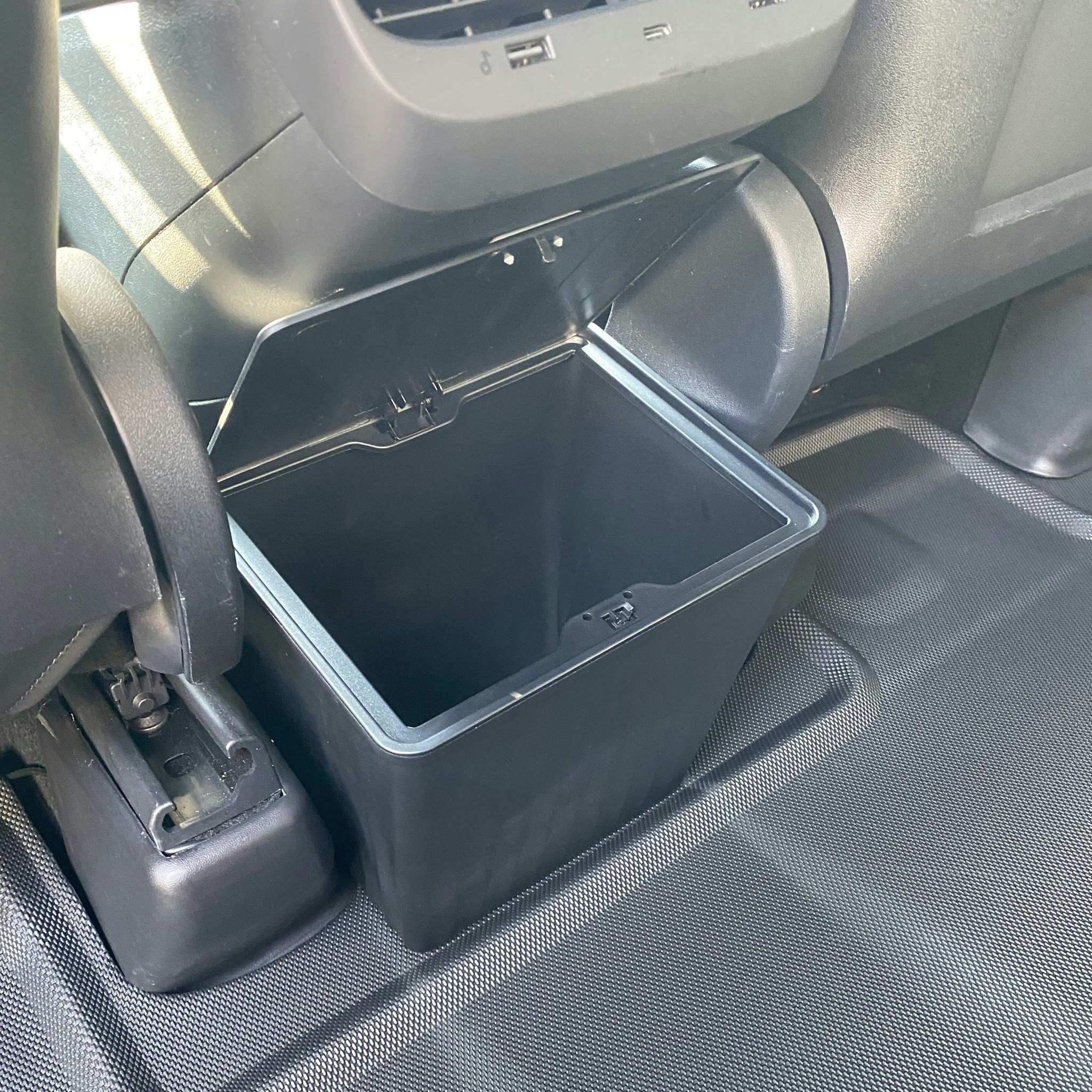 Rear seat storage, click lid - black - Tesla Model Y