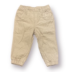 Beige byxor stl 80