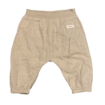 Beige byxor stl 62