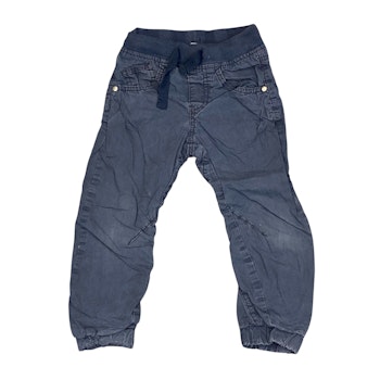 Blå byxor stl 98