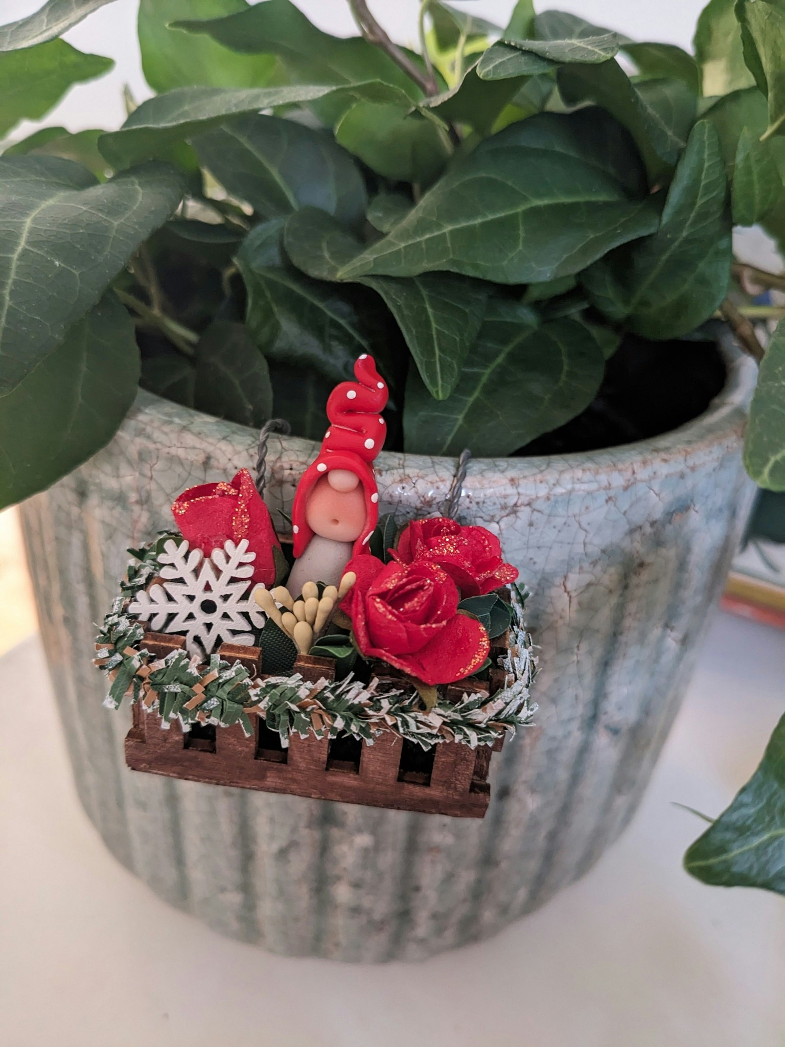 Miniblomlåda att hänga på blomkruka
