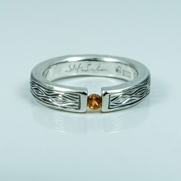 Flowing Bark silver ring with a Hessonite Garnet