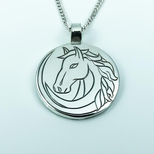 Hand-engraved horse pendent in silver