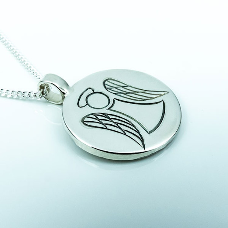Hand-engraved angel pendent in silver