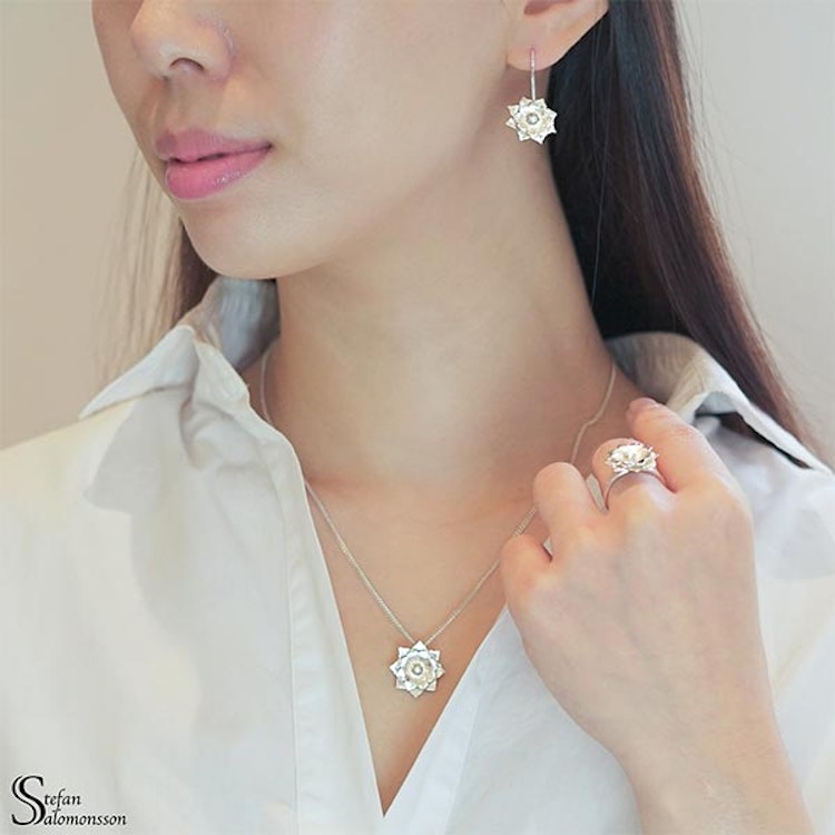 Silver lotus earrings with pearls