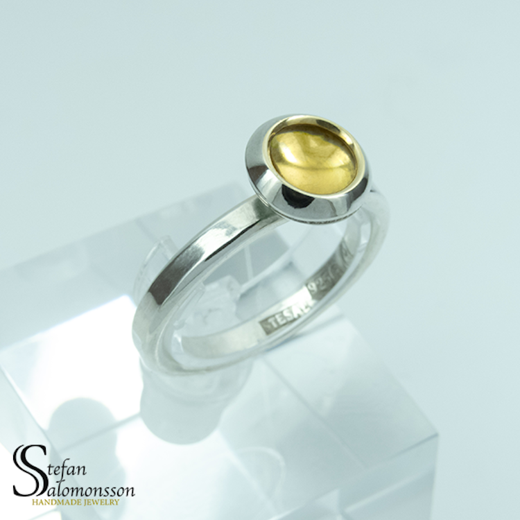 Silver ring with gold plating