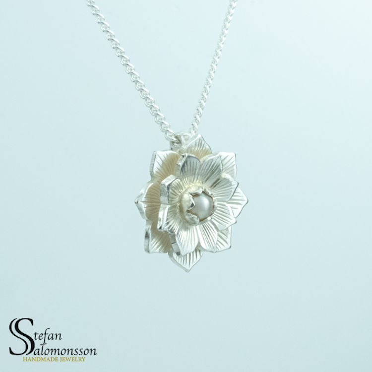 Silver lotus pendant with pearl