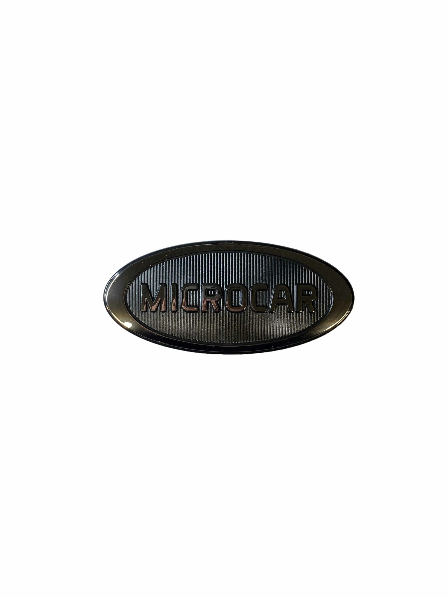 Emblem motorhuv Microcar (original)