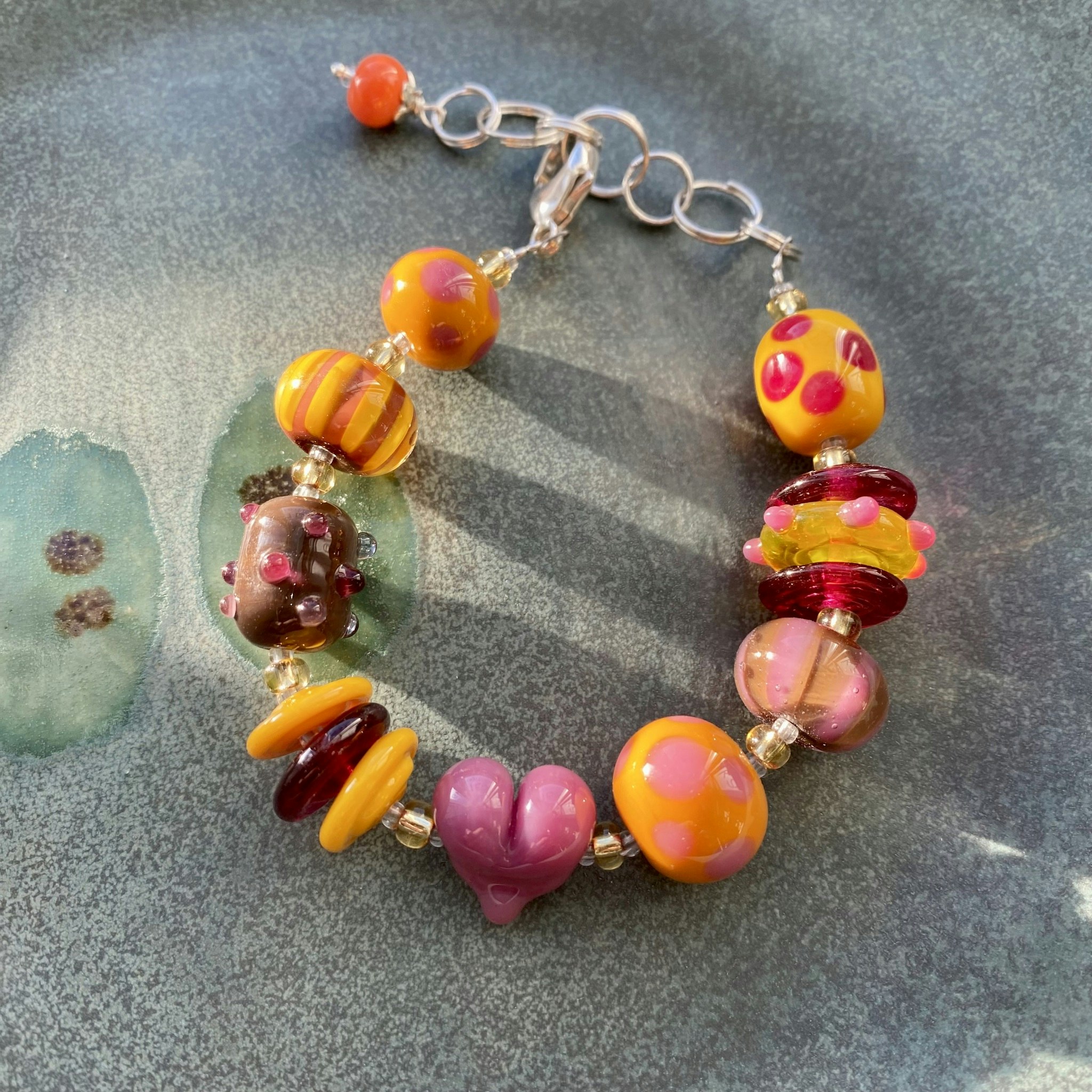 Armband orange/lila