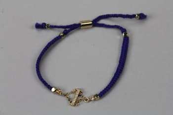 Handgjort armband i blått tyg och guld, Ettika design, California