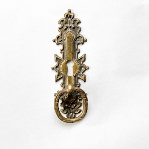 Möbelkläpp med nyckelhål i bronsoxid
