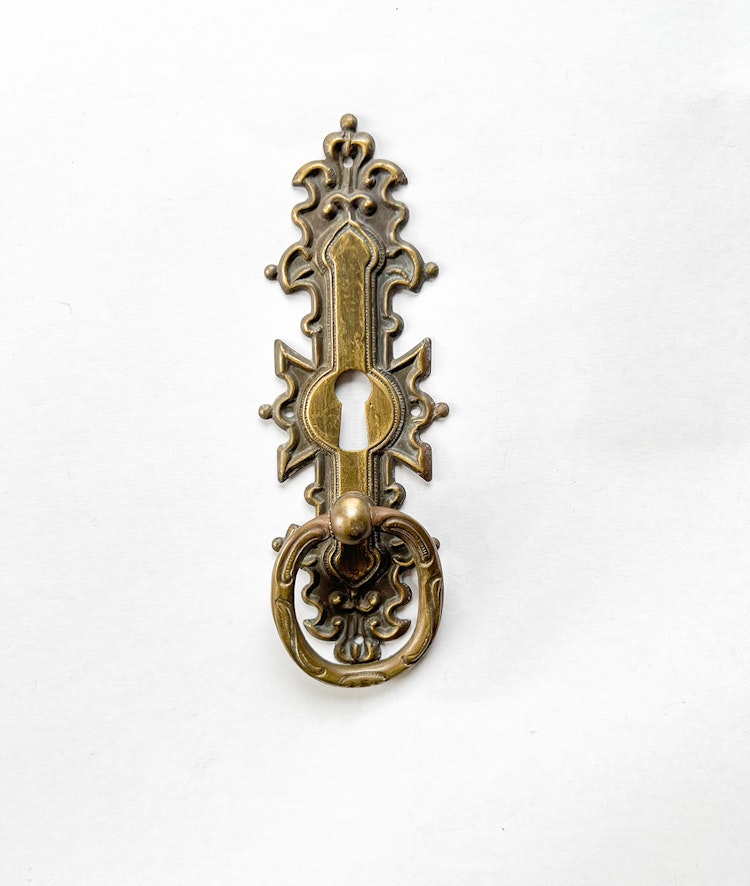 Möbelkläpp med nyckelhål i bronsoxid