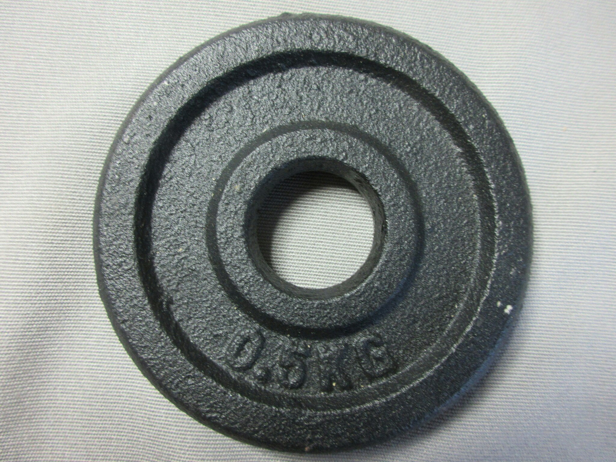 Viktskiva Gjutjärn 30 mm. 0,5 kg. 1 st.