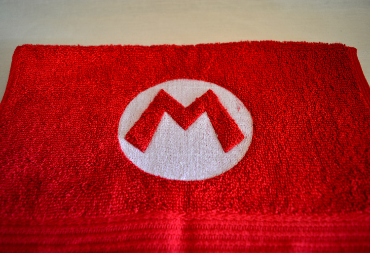 Gästhandduk - Super Mario logo
