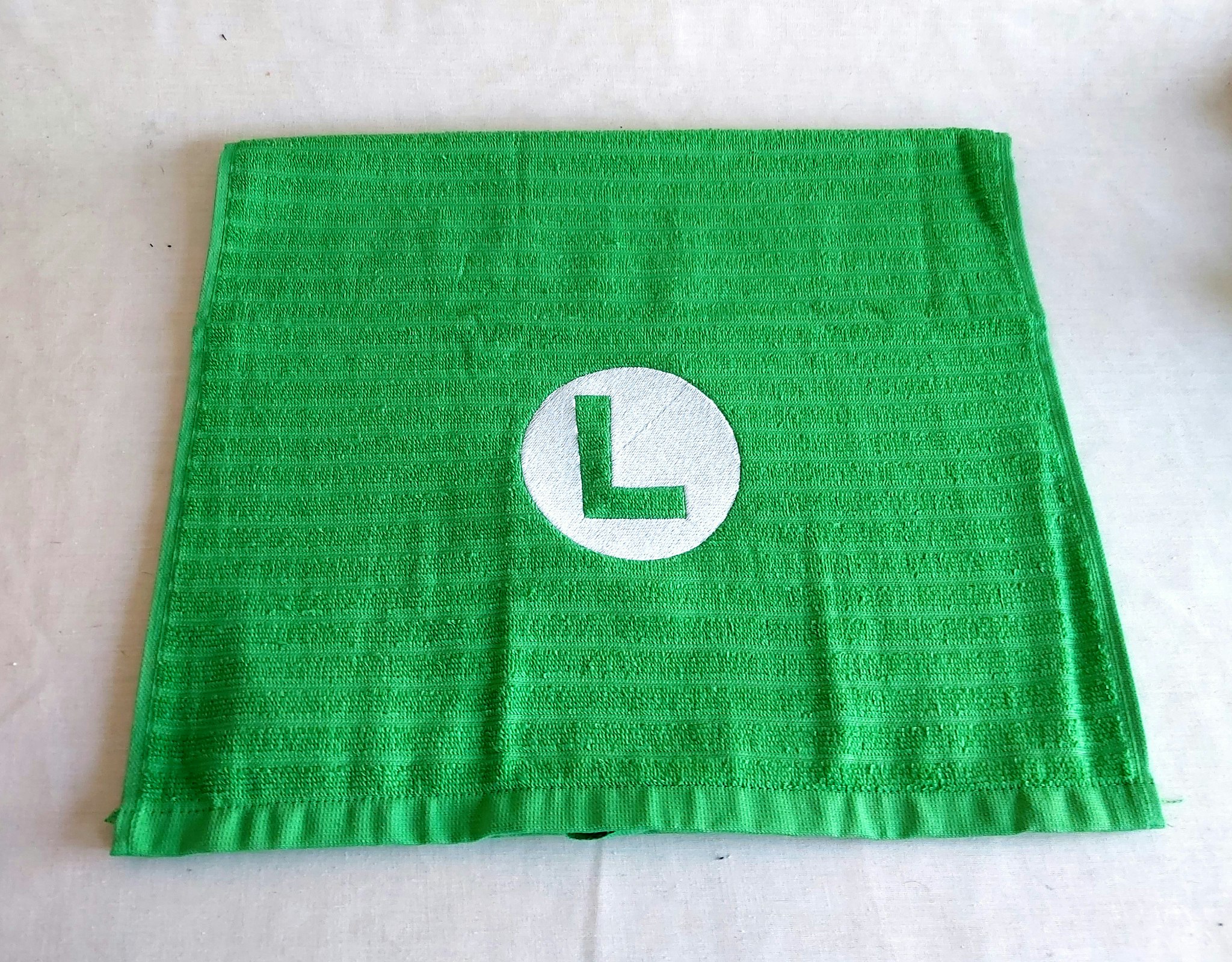 Gästhandduk - Super Mario logo - Luigi