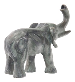 Fountain in the shape of an elephant (larger elephant, 11 cm) where it sprays from the trunk