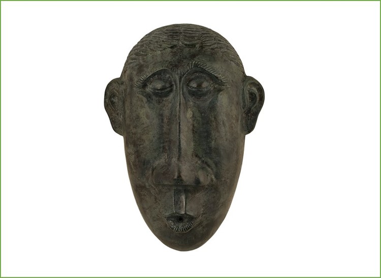 Wall fountain, mask, in bronze