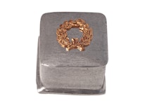 Square box in pewter with gold-colored laurel wreath on the lid from Munka Sweden