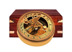 Compass and sundial in wooden box
