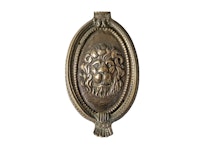 Door knocker with lion mascaron in antique brass