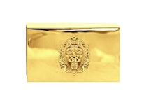 Matchbox in polished brass with lion mascaron