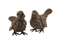 Litet par fåglar gjorda i brons