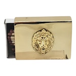 Medium size matchbox in polished brass with lion mascara