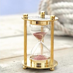 Hourglass in brass in wooden box