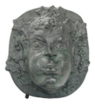 Fountain for wall with cherub face green patinated