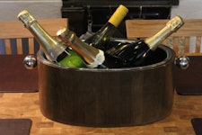 Champagne och vinkylare i ädelträ och rostfritt stål, oval, längd 42 cm, bred 22 cm, höjd 18 cm