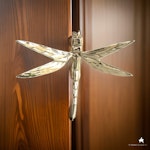 Doorknob in the hape of a dragonfly, brass