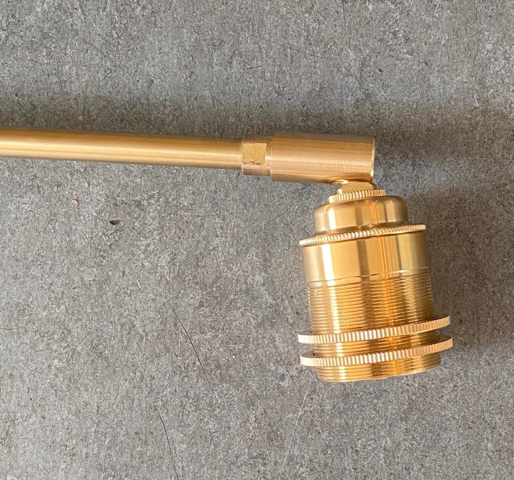 Vägglampa i obehandlad mässing WALL RING