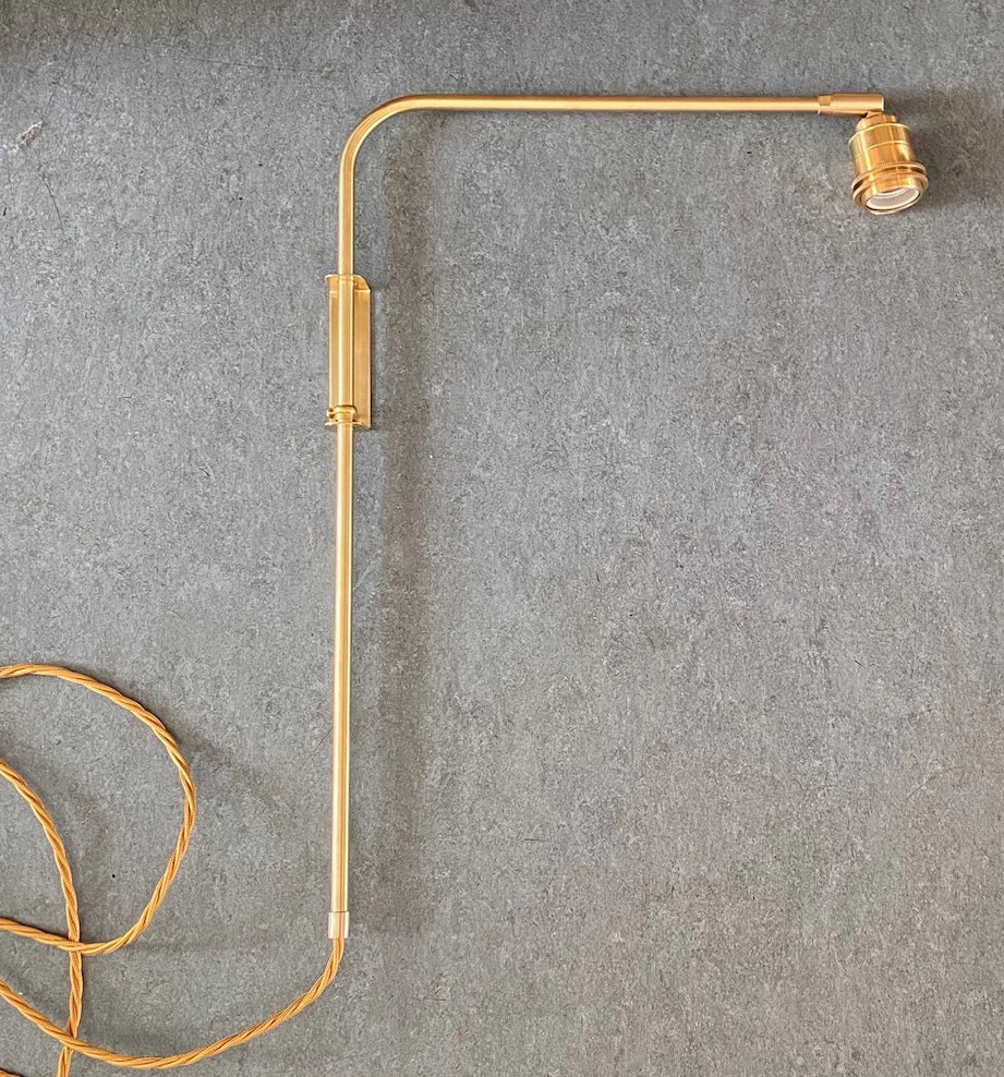 Vägglampa i obehandlad mässing WALL RING