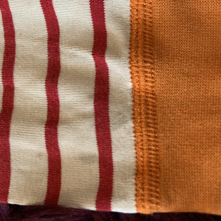 Randig tröja i vitt, rött, vinrött och orange från PoP stl 86