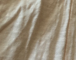 Ljusrosa jumpsuit med hålbroderi och volanger från HM stl 68