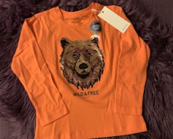 Orange tröja med björnmönster med vändbara paljetter från Tom Tailor stl 104/110